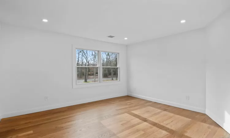 Unfurnished room featuring light hardwood / wood-style flooring