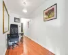 Office area featuring hardwood / wood-style floors