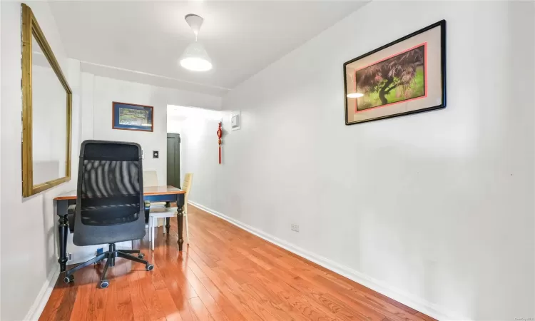 Office area featuring hardwood / wood-style floors