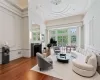 Formal Living Room with Soaring Ceilings and Fireplace