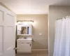 Bathroom featuring vanity and tile patterned floors