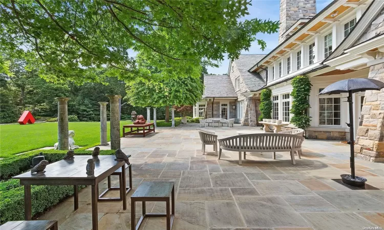 Expansive Bluestone Patio Overlooks Glorious Landscaping