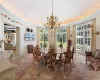 Exquisite Breakfast Room sits within Circular Turret with Cone Shaped Roof