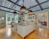 State-of-the Art Kitchen with custom cabinetry and wide plank pecan flooring