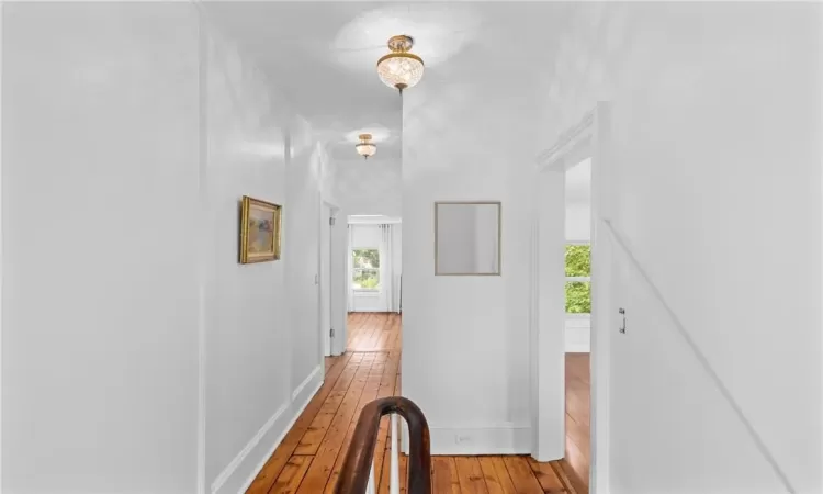 Hall with wood-type flooring