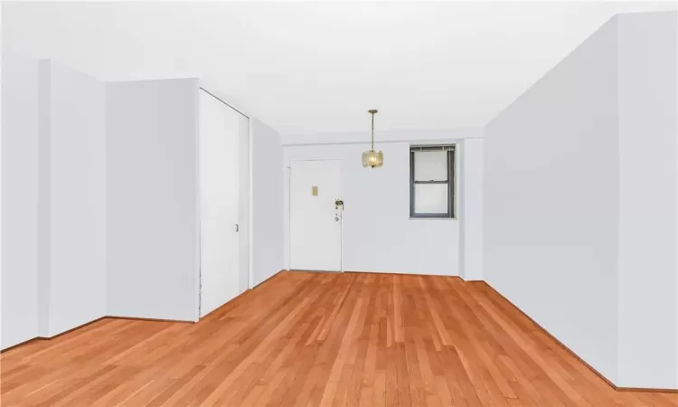 Spare room featuring light hardwood / wood-style floors