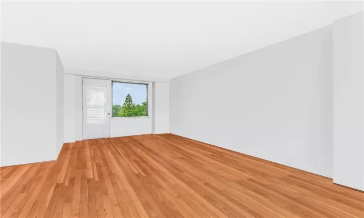 Spare room with light hardwood / wood-style floors