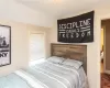 Bedroom featuring lofted ceiling