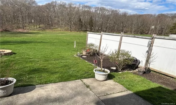 View of yard with a patio area