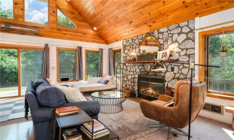 Living room with stone fireplace