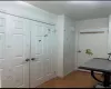 Foyer entrance with light wood-type flooring