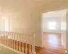 Corridor featuring light hardwood / wood-style flooring