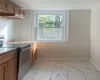 Kitchen featuring stainless steel electric stove