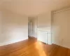 Empty room featuring hardwood / wood-style flooring