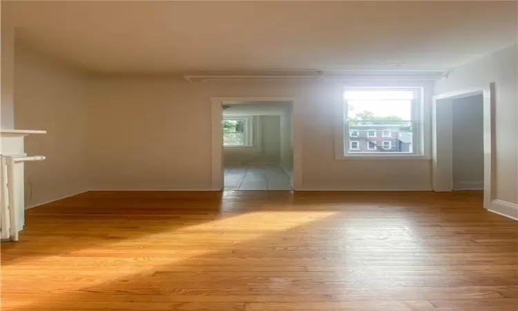 Empty room featuring light hardwood / wood-style flooring