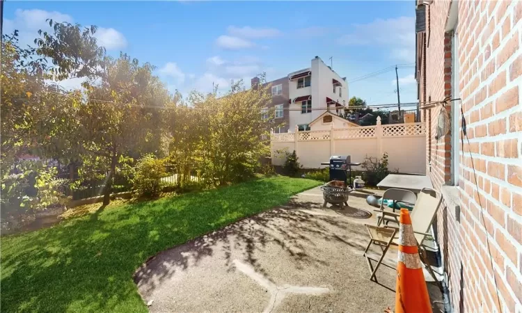 View of yard with a patio area