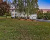 View of front of house featuring a lawn