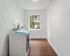 Laundry room featuring CERAMIC tile floor, a utility sink, and a gas dryer