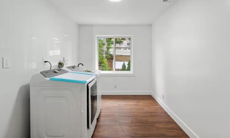 Laundry room featuring CERAMIC tile floor, a utility sink, and a gas dryer