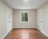 Jack and Jill bedroom with Oak hardwood flooring, great closets, and a jack and Jill bathroom