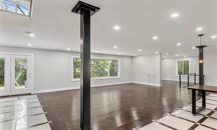 living room with light wood-type flooring and sink