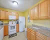 Kitchen with white appliances