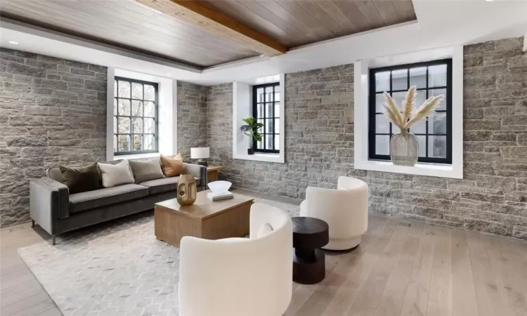 Similar living room with stone.