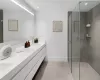 Similar primary bathroom.