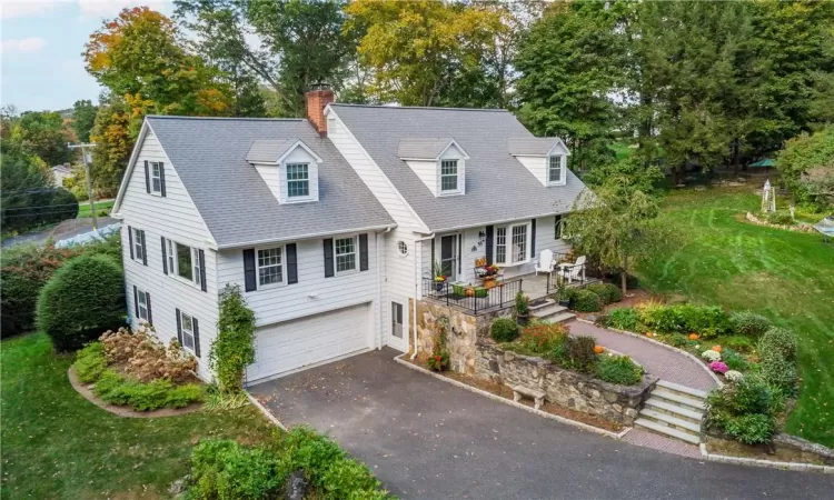 Cape cod-style house with a garage