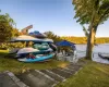 View of lakefront kayak racks and access to the lake