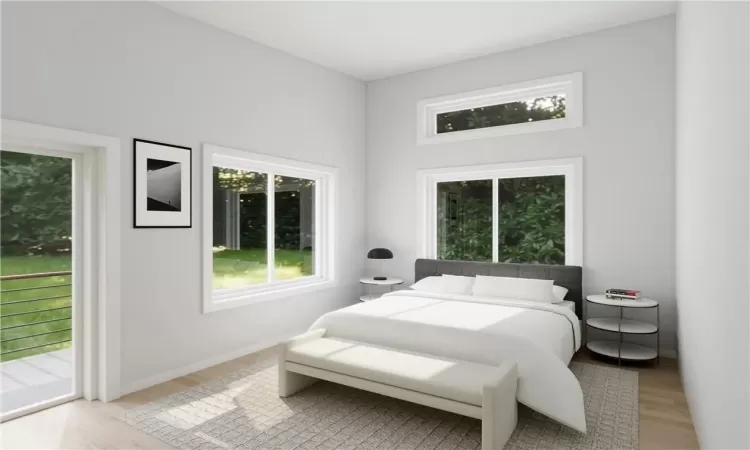 Bedroom featuring light wood-type flooring and access to outside