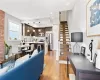 Living room featuring light hardwood / wood-style floors and sink