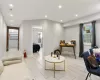 Living room featuring light tile patterned flooring