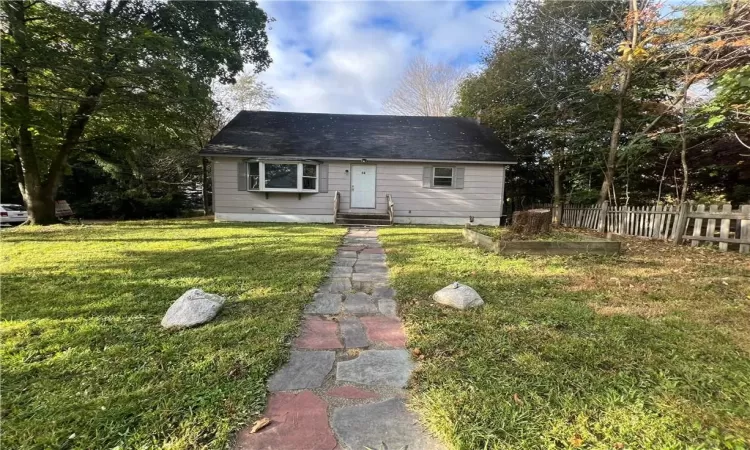 View of front of home with a front yard