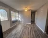 Entryway with ceiling fan and dark hardwood / wood-style flooring