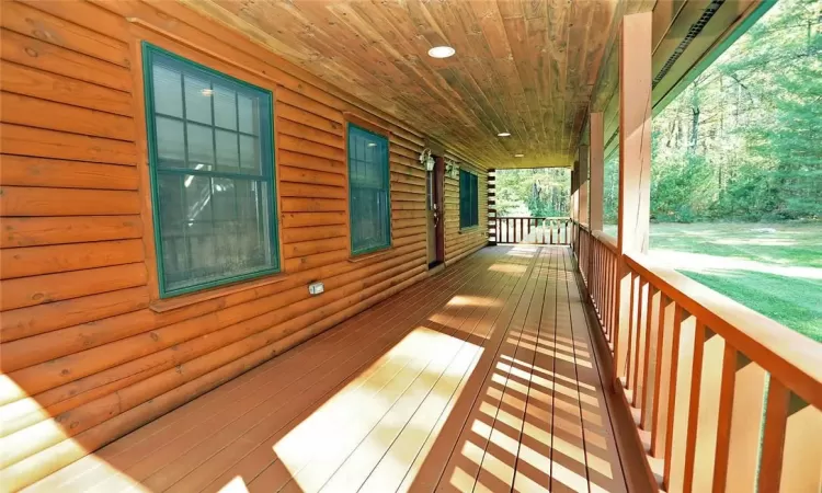 Wooden terrace with covered porch