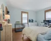 Bedroom featuring dark hardwood / wood-style floors