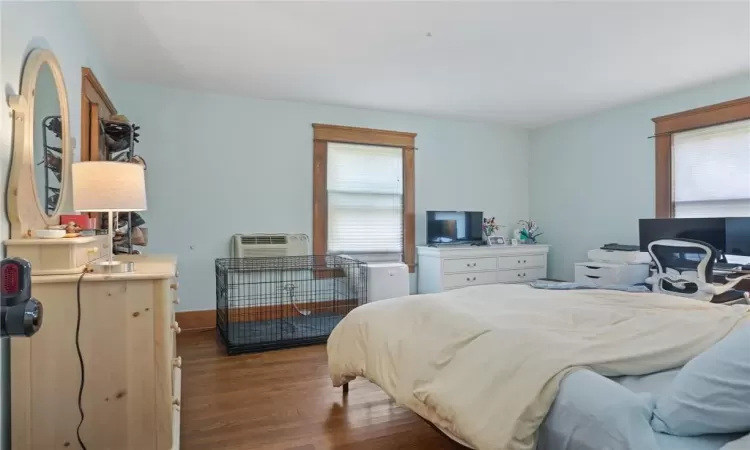 Bedroom featuring dark hardwood / wood-style floors