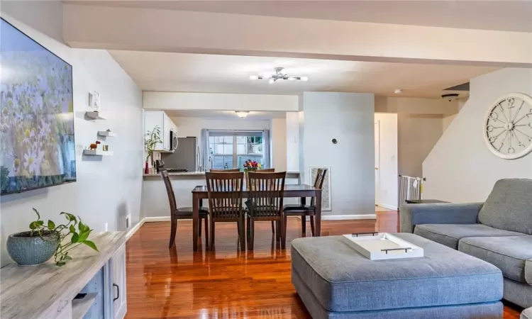 Living room featuring dark hardwood / wood-style flooring