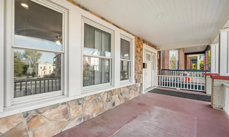 View of patio with a porch