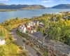 Drone / aerial view with a water and mountain view