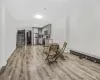 Sitting room featuring light hardwood / wood-style floors