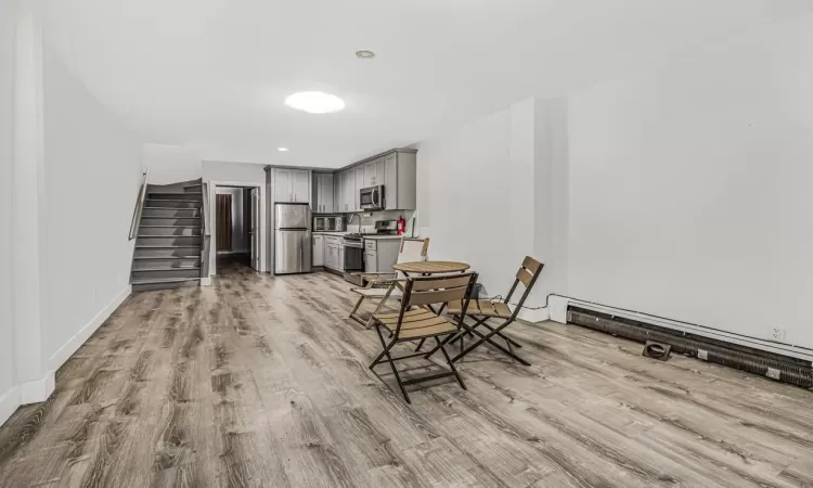 Sitting room featuring light hardwood / wood-style floors