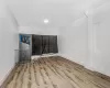 Unfurnished room with wood-type flooring