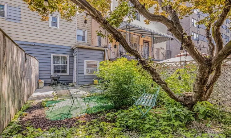 Back of property with a patio area