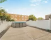 View of patio with a fenced in pool