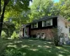 View of front of property featuring a front lawn