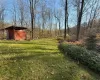 View of yard with a storage shed