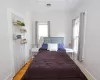 Bedroom featuring hardwood / wood-style flooring