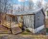 Front of house featuring a wooden deck